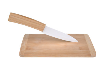 Ceramic knife on chopping board