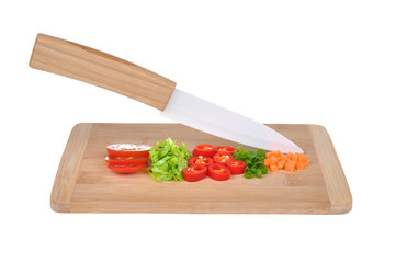 Ceramic knife and vegetables