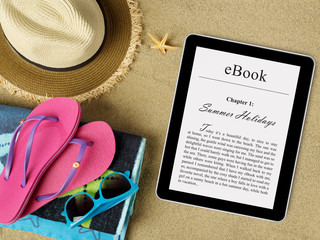 eBook tablet on beach