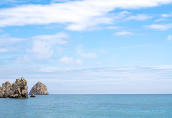 Fototapeta na wymiar Attractive Ocean Under Light Blue Sky in Panorama