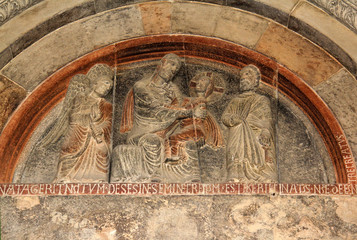 Fototapeta na wymiar lunetta portale laterale; collegiata di S. Maria a Castell'Arquato