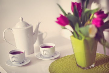 cups of tea with a teapot