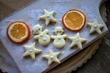 Christmas cookies - snowmen and stars with orange