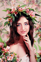 Young woman wearing pink flowers on her head 