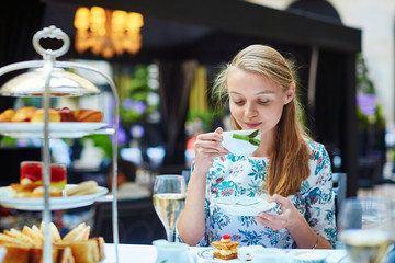 Young woman at the afternoon tea ceremony