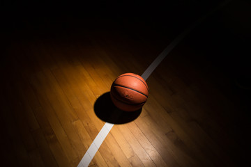 Basketball on court  with light effect