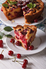 Sliced homemade cherry cake close-up vertical
