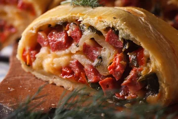 Zelfklevend Fotobehang tasty pie with ham, cheese and pepper macro horizontal © FomaA