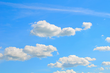 Naklejka na ściany i meble The blue sky with clouds