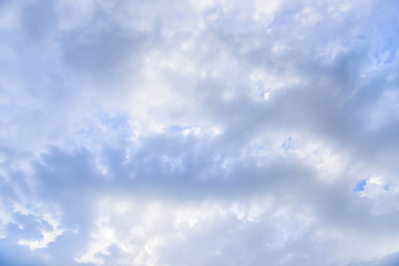 Rain clouds are gathering evening light from the sun as well.