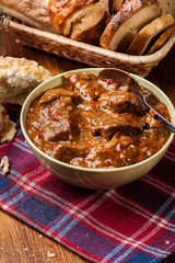 Beef stew served with crusty bread