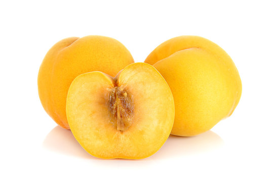 Yellow peach isolated on the white background