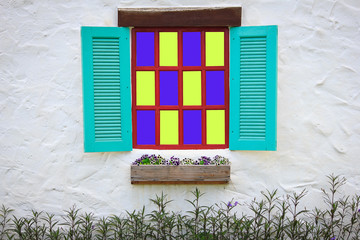 Brick Wall with Coloured Glass Window
