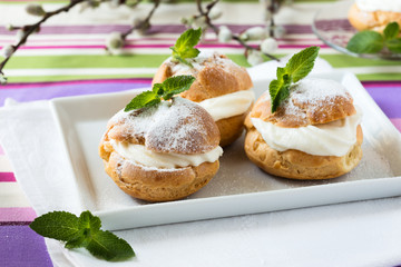 Profiteroles, cream puff, traditional French dessert