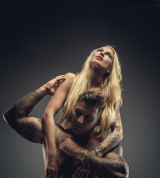 Man and woman with tattoos