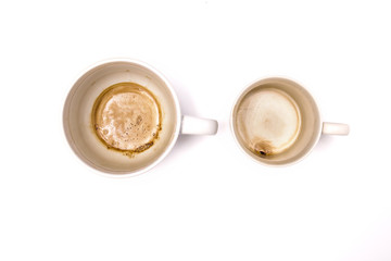 Used empty cup of coffee with brown coffee stained