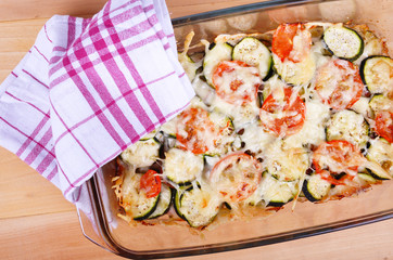 Tomatoes and zucchini baked with cheese