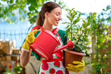 Young woman working in the garden