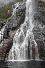 Fototapeta na wymiar Waterfall in the Norwegian fjords
