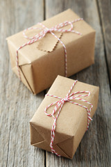 Beautiful gift boxes on grey wooden background