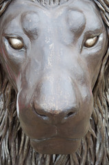 Fototapeta na wymiar Sculpure metalique chromé du lion