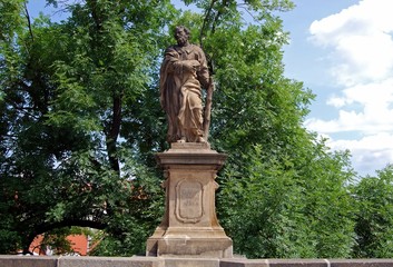 Fototapeta na wymiar Statue on Charles Bridge (Karluv Most), Prague.