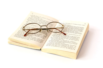 Open book with reading glasses