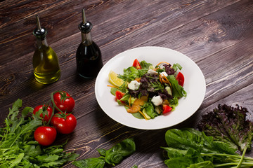 Salad with salmon fillet.