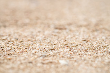 closeup of sand on the beach, shallow deep of field