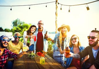 Obraz na płótnie Canvas Beach Party Dinner Friendship Happiness Summer Concept