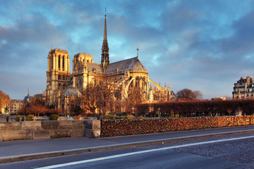 Fototapeta na wymiar Notre Dame of Paris arches and structure at sunrise light