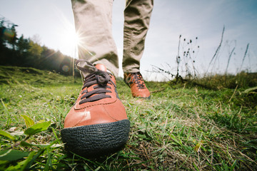 Close-up of female feet in sneakers running outdoors