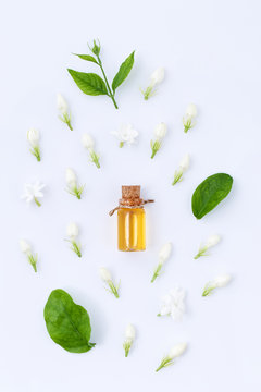 essential aroma oil with jasmine on white background