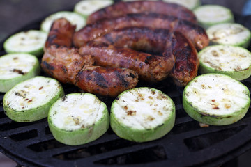 Grilled sausages and squash