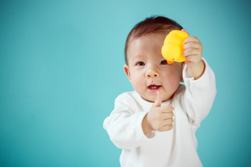 Baby playing rubber duck