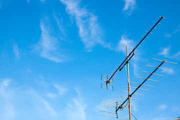 Antennas home TV on blue sky