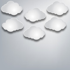 paper clouds on a background paper