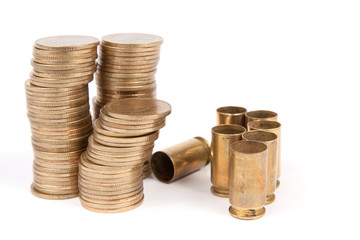 Coins thai baht and bullet shell on white background