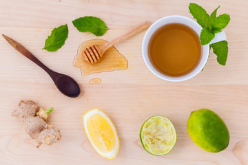 Cups of herbal  tea with aromatic herbal with lemon , lime and h