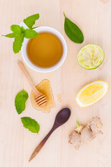 Cups of herbal  tea with aromatic herbal with lemon , lime and h