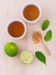 Cups of herbal  tea with aromatic herbal with lemon , lime and h