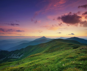 Mountain valley during sunrise. Natural summer landscape.