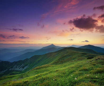 Fototapeta Mountain valley during sunrise. Natural summer landscape.