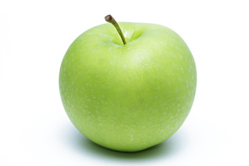 Green apple with dew  on white background