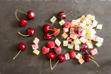 Turkish Delight with ripe raspberries and blueberries