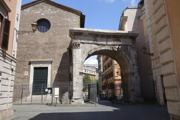 Fototapeta na wymiar Triumphal Arch of Gallienus and the church of San Vito Rome Italy