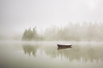 Fototapeta premium Boat in mysterious fog