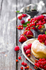 Morning breakfast with mini donuts and berries