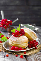 Morning breakfast with mini donuts and berries
