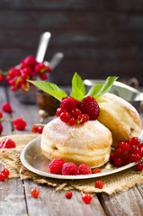 Morning breakfast with mini donuts and berries